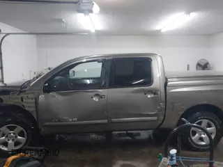 2006 Nissan Titan LE z VIN 1N6BA07B26N572273, wystawiony jako IAAI lot #41252390 z przebiegiem 88 457 mil mil oraz . Historia ofert i sprzedaży dostępna na DreamBid. Obrazek 15.