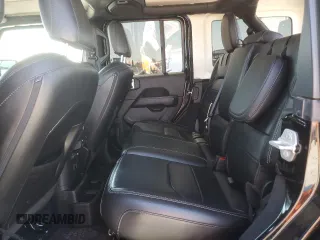 2023 Jeep Wrangler Sahara with VIN 1C4JJXP61PW512975, listed as a Copart auction lot 59392075 with 26,954 mi miles and Salvage title. Bid and sale history available at DreamBid. Image 10.