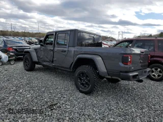 2023 Jeep Gladiator Sport S with VIN 1C6HJTAG9PL572388, listed as a Copart auction lot 53346475 with 11,081 mi miles and Salvage title. Bid and sale history available at DreamBid. Image 2.