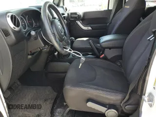 2014 Jeep Wrangler Unlimited Sahara z VIN 1C4BJWEG8EL188271, wystawiony jako Copart lot #59972535 z przebiegiem 130 314 mil mil oraz Szkoda całkowita • Salvage title. Historia ofert i sprzedaży dostępna na DreamBid. Obrazek 7.