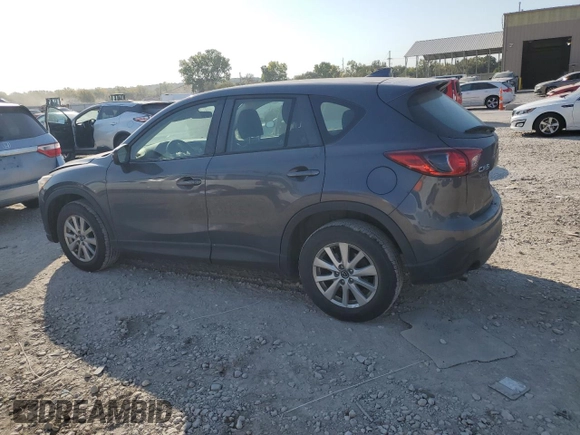 2016 Mazda CX-5 Sport with VIN JM3KE2BE7G0739544, listed as a Copart auction lot 75557244 with 128,336 mi miles and Salvage Title. Bid and sale history available at DreamBid. Image 2.