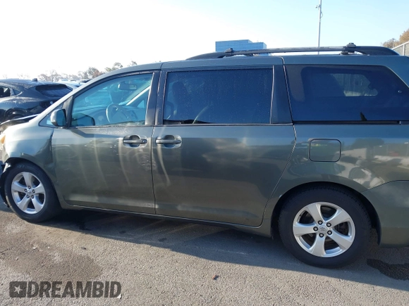 2013 Toyota Sienna LE AAS with VIN 5TDKK3DC0DS313786, listed as a IAAI auction lot 41981268 with 162,423 mi miles. Bid and sale history available at carsss.com. Image 14.