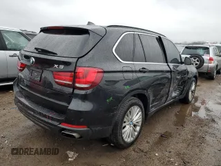 2014 BMW X5 xDrive50i with VIN 5UXKR6C56E0J72600, listed as a Copart auction lot 51280085 with 133,543 mi miles and Salvage Title. Bid and sale history available at carsss.com. Image 3.