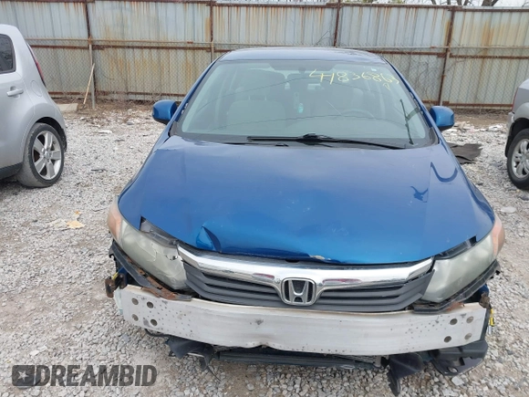 2012 Honda Civic LX z VIN 19XFB2F57CE053373, wystawiony jako IAAI lot #41836863 z przebiegiem 123 339 mil mil oraz . Historia ofert i sprzedaży dostępna na DreamBid. Obrazek 13.