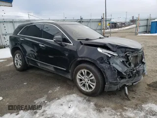 2020 Cadillac XT5 Premium Luxury AWD with VIN 1GYKNDRS6LZ131191, listed as a Copart auction lot 48476555 with 101,320 mi miles and Salvage Title. Bid and sale history available at DreamBid. Image 4.