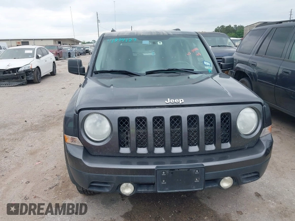 2014 Jeep Patriot Latitude with VIN 1C4NJRFB3ED810819, listed as a IAAI auction lot 41994129 with 145,733 mi miles and . Bid and sale history available at carsss.com. Image 6.