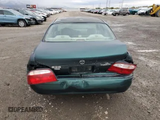 2001 Mazda 626 LX with VIN 1YVGF22C215245817, listed as a Copart auction lot 80491144 with 147,603 mi miles and Salvage Title. Bid and sale history available at carsss.com. Image 6.