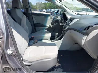 2014 Hyundai Accent GLS with VIN KMHCT4AE4EU661497, listed as a IAAI auction lot 41987134 with 129,508 mi miles. Bid and sale history available at carsss.com. Image 5.