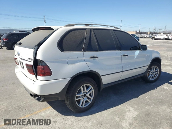 2006 BMW X5 3.0i with VIN 5UXFA135X6LY28695, listed as a Copart auction lot 77018914 with 209,013 mi miles and Salvage Title. Bid and sale history available at carsss.com. Image 3.