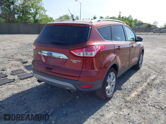 2016 Ford Escape Titanium with VIN 1FMCU9JX9GUA16892, listed as a IAAI auction lot 42110986 with 87,775 mi miles and . Bid and sale history available at DreamBid. Image 4.