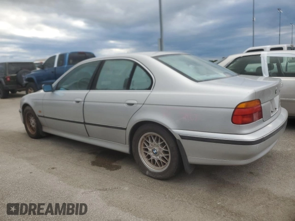 1999 BMW 5 Series 528iA with VIN WBADM6332XBY30585, listed as a Copart auction lot 74830704 with 0 mi miles and Salvage Title. Bid and sale history available at carsss.com. Image 2.
