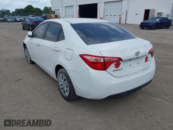 2019 Toyota Corolla L with VIN 5YFBURHE7KP908794, listed as a IAAI auction lot 38524964 with 65,069 mi miles. Bid and sale history available at carsss.com. Image 3.