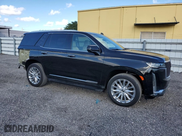 2023 Cadillac Escalade 4WD Premium Luxury z VIN 1GYS4BKL3PR236058, wystawiony jako Copart lot #46817095 z przebiegiem 53 089 mil mil oraz Tytuł czysty. Historia ofert i sprzedaży dostępna na DreamBid. Obrazek 4.