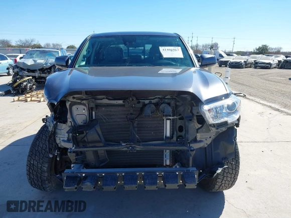 2023 Toyota Tacoma 4WD SR with VIN 3TYCZ5AN1PT146719, listed as a IAAI auction lot 41406963 with 19,735 mi miles. Bid and sale history available at carsss.com. Image 13.