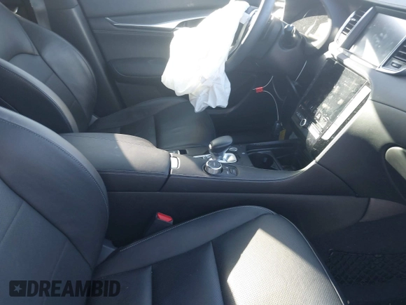 2023 Infiniti QX55 Luxe z VIN 3PCAJ5JR7PF109627, wystawiony jako IAAI lot #41213605 z przebiegiem 16 561 mil mil oraz . Historia ofert i sprzedaży dostępna na DreamBid. Obrazek 5.