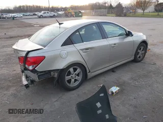 2014 Chevrolet Cruze 1LT z VIN 1G1PC5SB1E7341321, wystawiony jako IAAI lot #42527362 z przebiegiem 171 570 mil mil oraz . Historia ofert i sprzedaży dostępna na DreamBid. Obrazek 4.