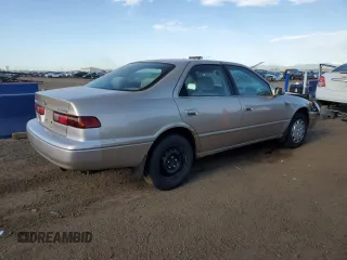 1999 Toyota Camry LE с VIN 4T1BG22K7XU516756, выставлен на аукционе Copart как лот 54065105 с пробегом 176 051 миль миль и Списание • Salvage title. История ставок и продаж доступна на DreamBid. Изображение 3.