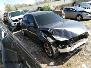 2012 BMW 3 Series 328i with VIN WBA3A5C57CF346074, listed as a IAAI auction lot 41985521 with 160,172 mi miles. Bid and sale history available at carsss.com. Image 1.