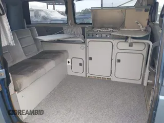 1989 Volkswagen Vanagon with VIN WV2YB0252KH059286, listed as a IAAI auction lot 42137080 with 130,604 mi miles and . Bid and sale history available at DreamBid. Image 8.
