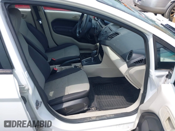 2013 Ford Fiesta S with VIN 3FADP4TJ4DM164594, listed as a IAAI auction lot 42154202 with 75,860 mi miles and . Bid and sale history available at DreamBid. Image 5.