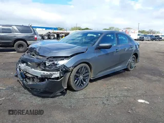 2021 Honda Civic Sport with VIN SHHFK7H40MU222581, listed as a IAAI auction lot 41451121 with 28,372 mi miles and . Bid and sale history available at DreamBid. Image 2.