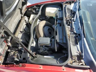 1988 Pontiac Fiero z VIN 1G2PE11R1JP219470, wystawiony jako Copart lot #77772864 z przebiegiem 94 011 mil mil oraz Szkody całkowita. Historia ofert i sprzedaży dostępna na DreamBid. Obrazek 11.