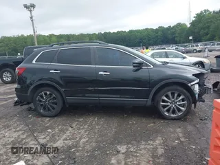 2015 Mazda CX-9 Grand Touring with VIN JM3TB2DA1F0464517, listed as a IAAI auction lot 42484985 with 104,932 mi miles and . Bid and sale history available at DreamBid. Image 14.