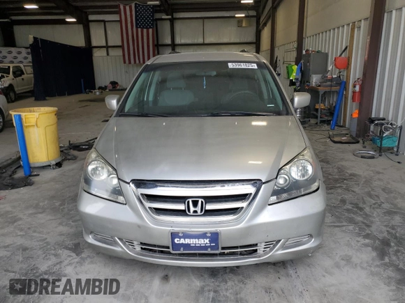 2007 Honda Odyssey EX with VIN 5FNRL38477B429624, listed as a Copart auction lot 53961825 with 144,957 mi miles and Salvage Title. Bid and sale history available at DreamBid. Image 5.