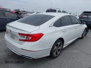 2020 Honda Accord EX with VIN 1HGCV1F45LA144111, listed as a IAAI auction lot 42359721 with 97,973 mi miles and . Bid and sale history available at DreamBid. Image 4.