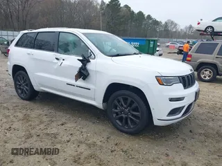 2019 Jeep Grand Cherokee High Altitude with VIN 1C4RJFCTXKC595552, listed as a IAAI auction lot 41877039 with 102,394 mi miles and . Bid and sale history available at DreamBid. Image 1.