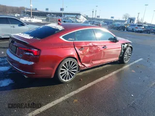 2018 Audi A5 Sportback Prestige z VIN WAUCNCF5XJA052165, wystawiony jako IAAI lot #41321114 z przebiegiem 62 648 mil mil oraz . Historia ofert i sprzedaży dostępna na DreamBid. Obrazek 4.