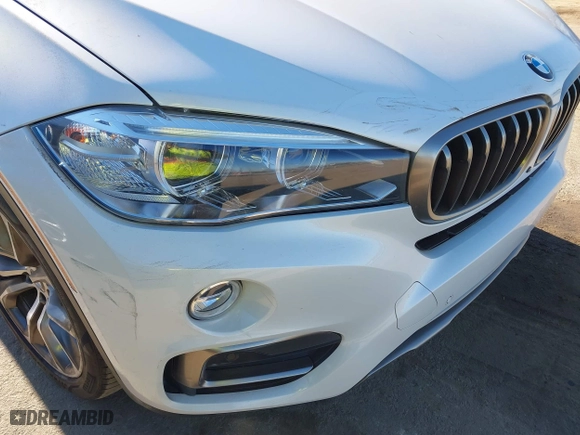 2017 BMW X6 xDrive35i with VIN 5UXKU2C3XH0U29395, listed as a IAAI auction lot 41237496 with 82,836 mi miles. Bid and sale history available at carsss.com. Image 6.