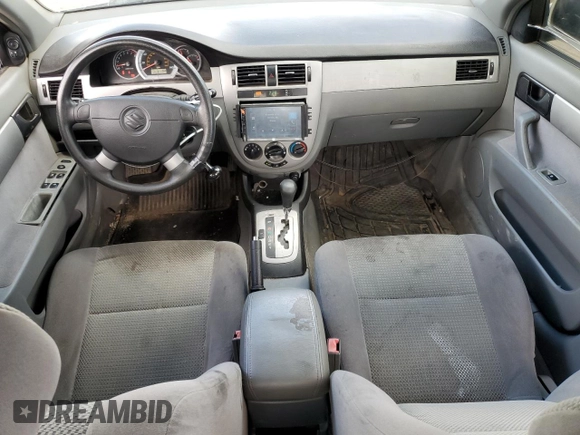 2006 Suzuki Forenza z VIN KL5JD56Z86K350488, wystawiony jako Copart lot #67422784 z przebiegiem 125 251 mil mil oraz Czysty tytuł • Clean title. Historia ofert i sprzedaży dostępna na DreamBid. Obrazek 8.