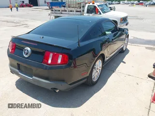 2012 Ford Mustang Premium with VIN 1ZVBP8AM0C5221428, listed as a IAAI auction lot 42273202 with 196,402 mi miles and . Bid and sale history available at DreamBid. Image 4.