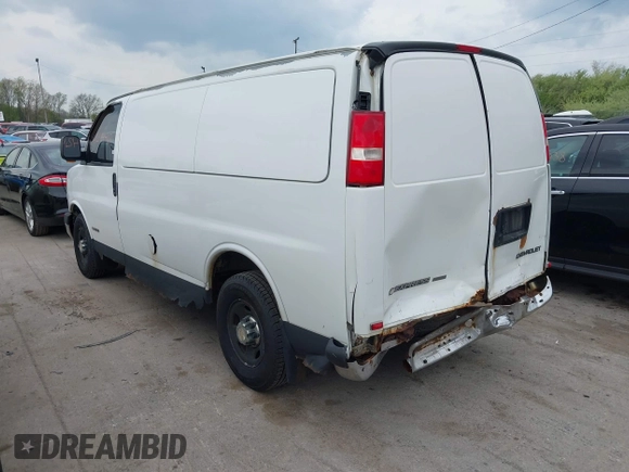 2003 Chevrolet Express Cargo with VIN 1GCGG25V031175986, listed as a IAAI auction lot 42144402 with 353,661 mi miles and . Bid and sale history available at DreamBid. Image 3.