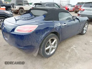 2009 Saturn Sky Red Line z VIN 1G8MT35X09Y105064, wystawiony jako IAAI lot #42197028 z przebiegiem 106 673 mil mil oraz . Historia ofert i sprzedaży dostępna na DreamBid. Obrazek 4.