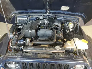 2006 Jeep Wrangler SE with VIN 1J4FA29126P705827, listed as a Copart auction lot 82226674 with 165,632 mi miles and Salvage Title. Bid and sale history available at carsss.com. Image 11.