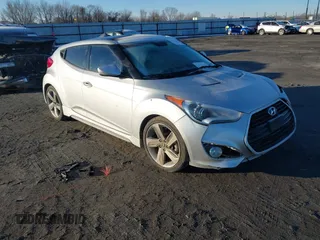 2013 Hyundai Veloster Turbo with VIN KMHTC6AE8DU107616, listed as a IAAI auction lot 41293348 with 152,567 mi miles and . Bid and sale history available at DreamBid. Image 1.