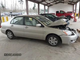 2005 Mitsubishi Lancer ES with VIN JA3AJ26E65U017027, listed as a IAAI auction lot 41765578 with 58,698 mi miles. Bid and sale history available at carsss.com. Image 13.
