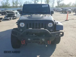 2017 Jeep Wrangler Unlimited Rubicon z VIN 1C4BJWFGXHL737844, wystawiony jako Copart lot #53044635 z przebiegiem 49 286 mil mil oraz Czysty tytuł • Clean title. Historia ofert i sprzedaży dostępna na DreamBid. Obrazek 5.