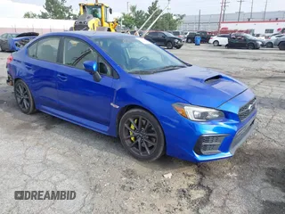 2020 Subaru WRX STI with VIN JF1VA2E63L9806965, listed as a IAAI auction lot 42342839 with 106,863 mi miles and . Bid and sale history available at DreamBid. Image 1.