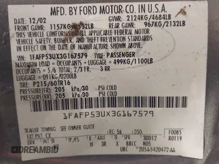 2003 Ford Taurus SE Standard z VIN 1FAFP53UX3G167579, wystawiony jako IAAI lot #42140606 z przebiegiem 178 147 mil mil oraz . Historia ofert i sprzedaży dostępna na DreamBid. Obrazek 9.