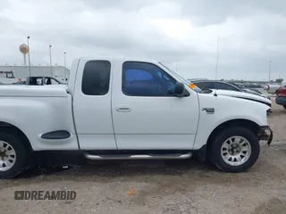 2001 Ford F-150 XL with VIN 2FTRX07L21CA73710, listed as a IAAI auction lot 41934098 with 1 mi miles. Bid and sale history available at carsss.com. Image 14.