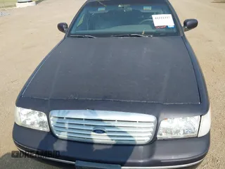 2000 Ford Crown Victoria LX z VIN 2FAFP74W4YX188831, wystawiony jako IAAI lot #41221337 z przebiegiem 169 380 mil mil oraz . Historia ofert i sprzedaży dostępna na DreamBid. Obrazek 6.
