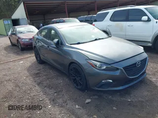 2014 Mazda 3 S Grand Touring with VIN JM1BM1W35E1212740, listed as a IAAI auction lot 41632056 with 158,872 mi miles and . Bid and sale history available at DreamBid. Image 1.