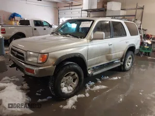1998 Toyota 4Runner SR5 with VIN JT3HN86R1W0183463, listed as a IAAI auction lot 41515690 with 299,355 mi miles and . Bid and sale history available at DreamBid. Image 2.