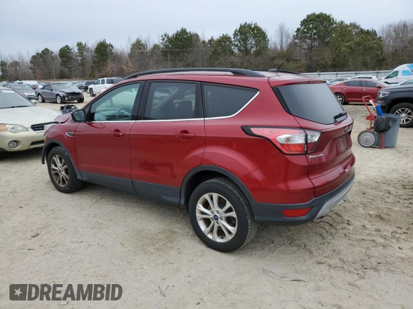 2018 Ford Escape SE with VIN 1FMCU0G9XJUB62780, listed as a Copart auction lot 88091125 with 75,511 mi miles and Salvage Title. Bid and sale history available at carsss.com. Image 2.