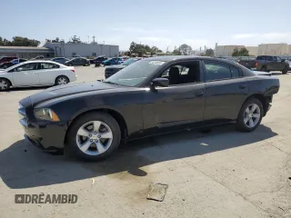 2012 Dodge Charger SE with VIN 2C3CDXBGXCH211974, listed as a Copart auction lot 54240055 with 172,879 mi miles and Salvage Title. Bid and sale history available at carsss.com. Image 1.
