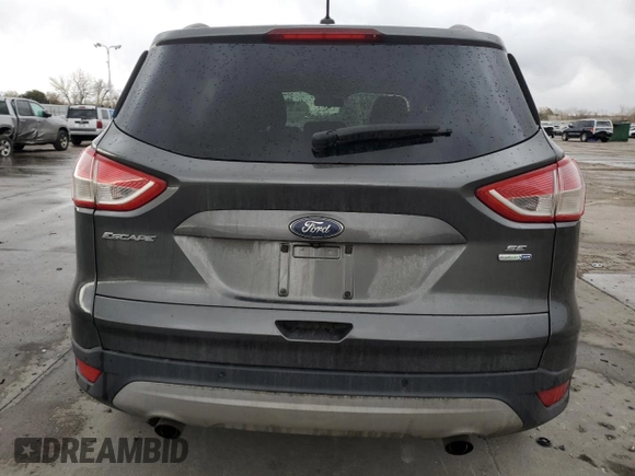 2016 Ford Escape SE with VIN 1FMCU9G97GUA48555, listed as a Copart auction lot 49285395 with 106,941 mi miles and Salvage Title. Bid and sale history available at DreamBid. Image 6.