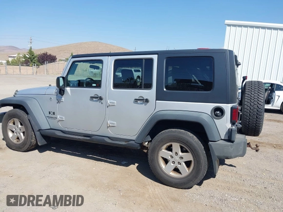 2008 Jeep Wrangler Unlimited X with VIN 1J4GA39168L592999, listed as a IAAI auction lot 42699909 with 158,128 mi miles and . Bid and sale history available at DreamBid. Image 14.